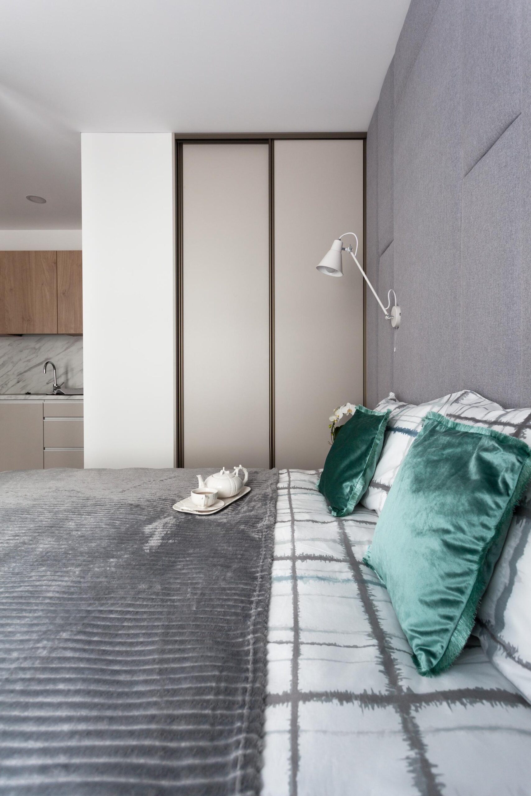 interior-of-a-small-studio-bedroom-with-grey-padde-2026-03-26-06-51-32-utc